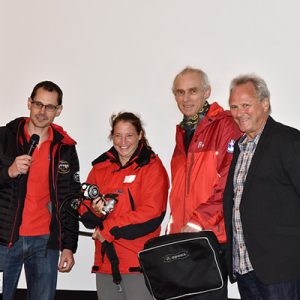 Chris Jewell (left) presenting donated APEKS diving regulators to team representatives.